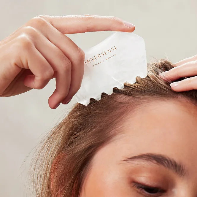 Innersense Scalp Massager on a closeup of a woman